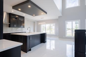 Black kitchen Cabinets with Sehjas Homes 